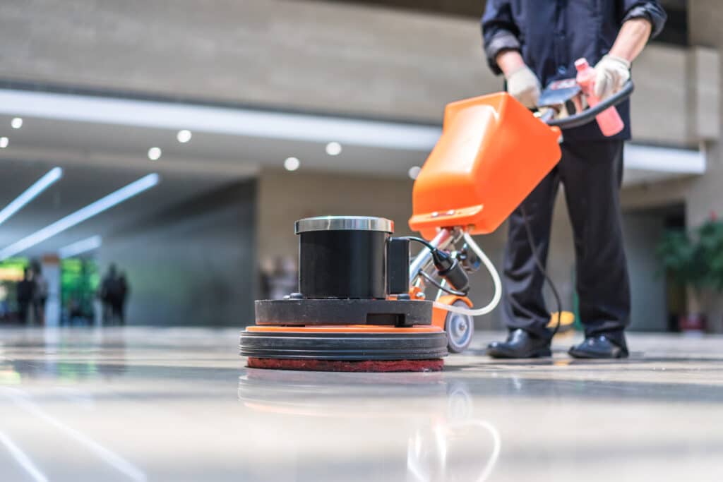 Amidst the urban hustle, a diligent cleaner tends to outdoor and indoor spaces, while moments of leisure and play add a touch of balance to the bustling scene.